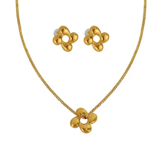 Set collar y aretes flor dorado acero inoxidable Aura’s