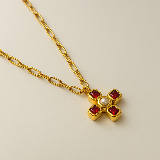 collar cruz con cadena gruesa dorada y piedras rojas